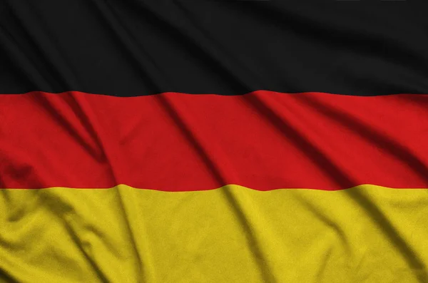 Flaga Niemiec Jest Przedstawiony Materiał Tkaniny Sportowe Dużo Chętnych Transparent — Zdjęcie stockowe