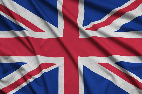 Flaga Wielkiej Brytanii Jest Przedstawiony Materiał Tkaniny Sportowe Dużo Chętnych — Zdjęcie stockowe