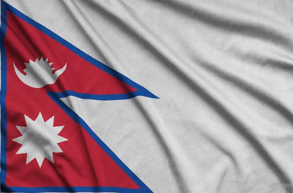 Bandera Nepal Representa Tejido Tela Deportiva Con Muchos Pliegues Equipo —  Fotos de Stock