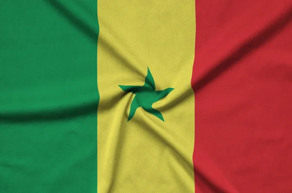 Senegalská Vlajka Zobrazen Sportovní Tkanina Tkaniny Mnoha Záhyby Sportovní Tým — Stock fotografie