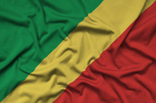 Congo flag  is depicted on a sports cloth fabric with many folds. Sport team waving banner