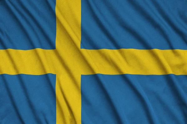 Sverige Flagga Avbildad Sport Tyg Med Många Veck Sport Team — Stockfoto