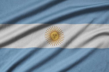 Arjantin bayrağı ile birçok çiziklere spor bez kumaş üzerinde tasvir edilmiştir. Spor takım sallayarak afiş