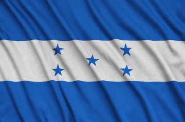 Honduras bayrağı ile birçok çiziklere spor bez kumaş üzerinde tasvir edilmiştir. Spor takım sallayarak afiş