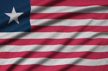 Liberya bayrağı ile birçok çiziklere spor bez kumaş üzerinde tasvir edilmiştir. Spor takım sallayarak afiş