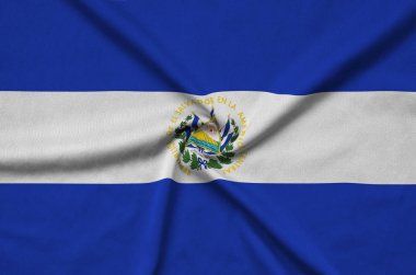 El Salvador bayrağı ile birçok çiziklere spor bez kumaş üzerinde tasvir edilmiştir. Spor takım sallayarak afiş
