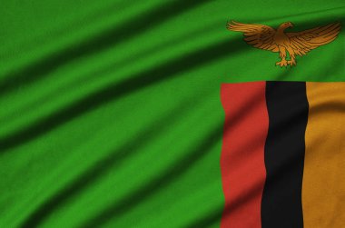 Zambiya bayrağı ile birçok çiziklere spor bez kumaş üzerinde tasvir edilmiştir. Spor takım sallayarak afiş