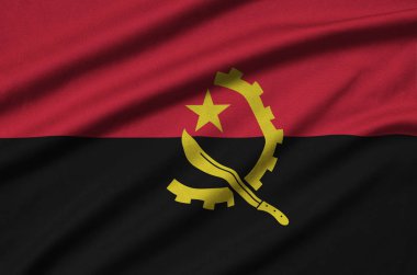 Angola bayrağı ile birçok çiziklere spor bez kumaş üzerinde tasvir edilmiştir. Spor takım sallayarak afiş