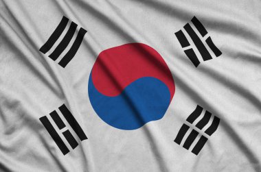 Güney Kore bayrağı ile birçok çiziklere spor bez kumaş üzerinde tasvir edilmiştir. Spor takım sallayarak afiş