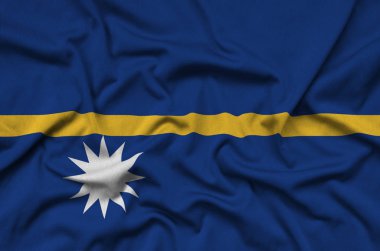Nauru bayrağı ile birçok çiziklere spor bez kumaş üzerinde tasvir edilmiştir. Spor takım sallayarak afiş
