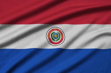 Paraguay bayrağı ile birçok çiziklere spor bez kumaş üzerinde tasvir edilmiştir. Spor takım sallayarak afiş