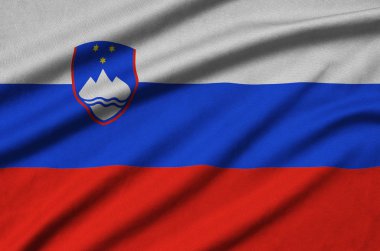 Slovenya bayrağı ile birçok çiziklere spor bez kumaş üzerinde tasvir edilmiştir. Spor takım sallayarak afiş