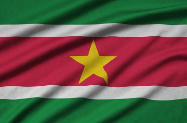 Surinam bayrağı ile birçok çiziklere spor bez kumaş üzerinde tasvir edilmiştir. Spor takım sallayarak afiş