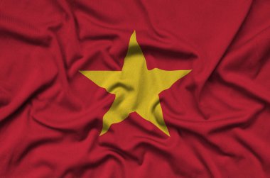 Vietnam bayrağı ile birçok çiziklere spor bez kumaş üzerinde tasvir edilmiştir. Spor takım sallayarak afiş