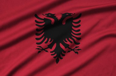  Arnavutluk bayrağı ile birçok çiziklere spor bez kumaş üzerinde tasvir edilmiştir. Spor takım sallayarak afiş