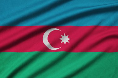 Azerbaycan bayrağı ile birçok çiziklere spor bez kumaş üzerinde tasvir edilmiştir. Spor takım sallayarak afiş
