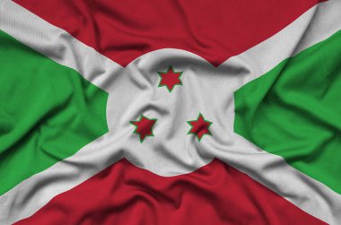 Burundi bayrağı ile birçok çiziklere spor bez kumaş üzerinde tasvir edilmiştir. Spor takım sallayarak afiş