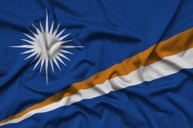 Marshall Islands flag  is depicted on a sports cloth fabric with many folds. Sport team waving banner clipart
