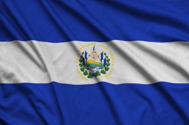 El Salvador bayrağı ile birçok çiziklere spor bez kumaş üzerinde tasvir edilmiştir. Spor takım sallayarak afiş