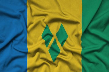 Saint Vincent ve Grenadinler bayrağı ile birçok çiziklere spor bez kumaş üzerinde tasvir edilmiştir. Spor takım sallayarak afiş