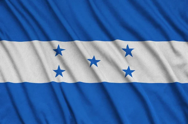 Honduras Vlajka Zobrazen Sportovní Tkanina Tkaniny Mnoha Záhyby Sportovní Tým — Stock fotografie