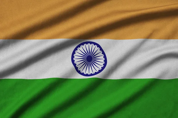 India flag  is depicted on a sports cloth fabric with many folds. Sport team waving banner