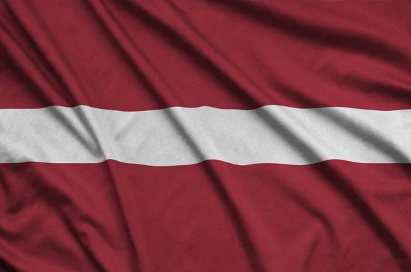 Прапор Латвії Зображена Спорт Тканини Тканини Багатьох Складок Спорт Команда — стокове фото