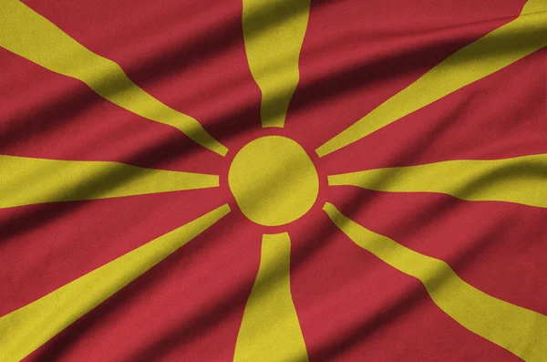 Bandeira Macedônia Representada Tecido Tecido Esportivo Com Muitas Dobras Esporte — Fotografia de Stock