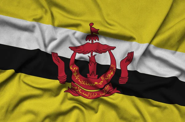 Brunei Darussalam Bandera Representa Tejido Tela Deportiva Con Muchos Pliegues — Foto de Stock