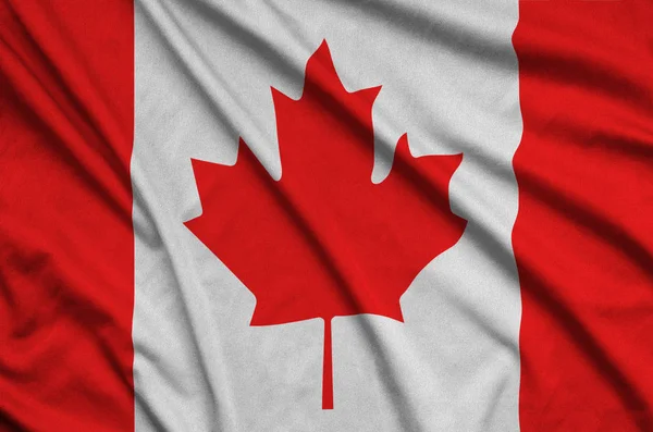 Die Kanadische Flagge Ist Auf Einem Sportstoff Mit Vielen Falten — Stockfoto
