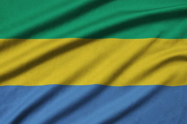 Gabon Flagge Ist Auf Einem Sportstoff Mit Vielen Falten Abgebildet — Stockfoto