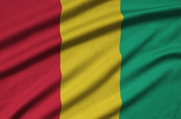 Vlajka Guiney Zobrazen Sportovní Tkanina Tkaniny Mnoha Záhyby Sportovní Tým — Stock fotografie