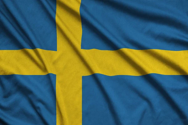 Sverige Flagga Avbildad Sport Tyg Med Många Veck Sport Team — Stockfoto