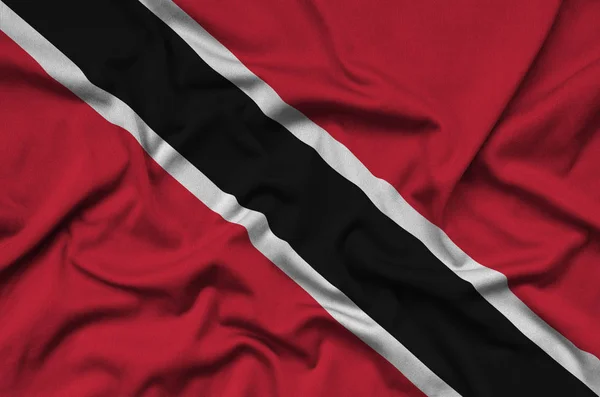特立尼达和多巴哥国旗上描绘了许多褶皱的运动布织物 运动队挥舞旗帜 — 图库照片