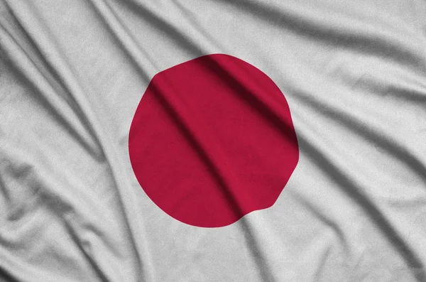 Флаг Японии Изображен Спортивной Ткани Множеством Складок Спортивная Команда Размахивает — стоковое фото