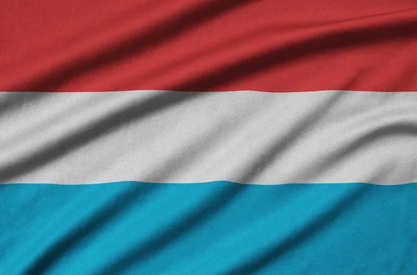 Bandera Luxemburgo Representa Tejido Tela Deportiva Con Muchos Pliegues Equipo —  Fotos de Stock