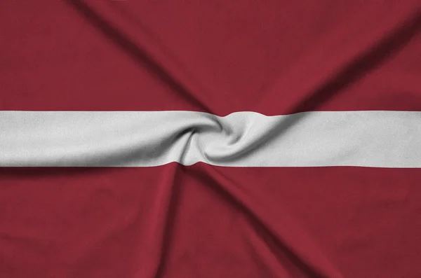 Bandera Letonia Representa Tejido Tela Deportiva Con Muchos Pliegues Equipo —  Fotos de Stock