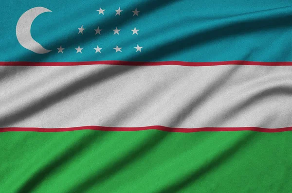 Uzbekistan Flag Depicted Sports Cloth Fabric Many Folds Sport Team — Stock Photo, Image