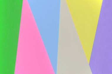 Doku arka planını moda pastel renkler. Pembe, mor, sarı, yeşil, bej ve mavi geometrik desen kağıtları. en az soyut.