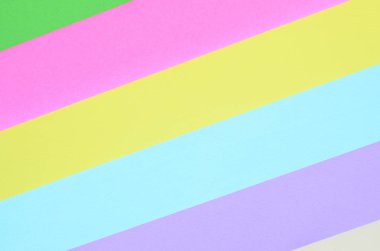 Doku arka planını moda pastel renkler. Pembe, mor, sarı, yeşil, bej ve mavi geometrik desen kağıtları. en az soyut.