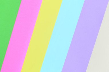 Doku arka planını moda pastel renkler. Pembe, mor, sarı, yeşil, bej ve mavi geometrik desen kağıtları. en az soyut.