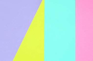 Doku arka planını moda pastel renkler. Pembe, mor, sarı ve mavi geometrik desen kağıtları. en az soyut.