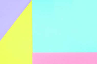 Doku arka planını moda pastel renkler. Pembe, mor, sarı ve mavi geometrik desen kağıtları. en az soyut.