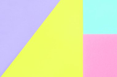 Doku arka planını moda pastel renkler. Pembe, mor, sarı ve mavi geometrik desen kağıtları. en az soyut.