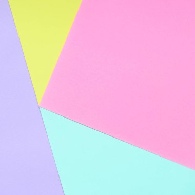 Doku arka planını moda pastel renkler. Pembe, mor, sarı ve mavi geometrik desen kağıtları. en az soyut.