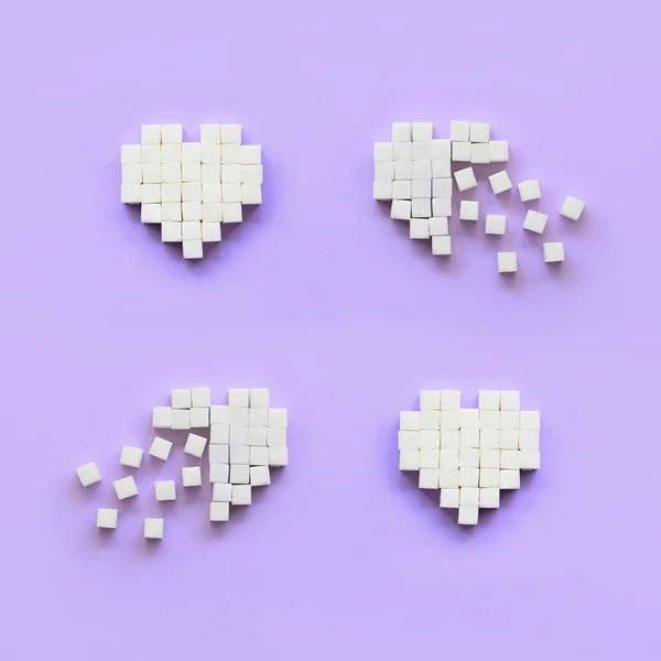 Ein Paar Herzen Aus Zuckerwürfeln Liegen Auf Einem Trendigen Pastellvioletten — Stockfoto