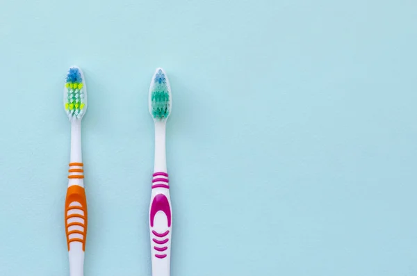 Two Toothbrushes Lie Pastel Blue Background Top View Flat Lay — Stock Photo, Image