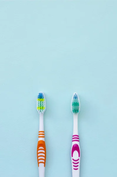 Two Toothbrushes Lie Pastel Blue Background Top View Flat Lay — Stock Photo, Image