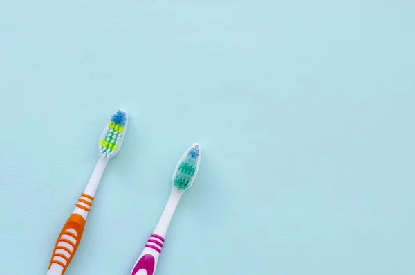 Two Toothbrushes Lie Pastel Blue Background Top View Flat Lay — Stock Photo, Image