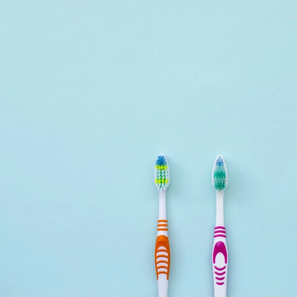 Two Toothbrushes Lie Pastel Blue Background Top View Flat Lay — Stock Photo, Image